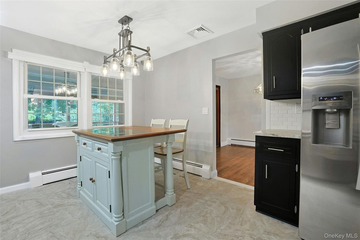 Dining room, Interior, Kitchen, Marble, Pendant Lights, Stainless Steel Appliances, Wood Texture Flooring