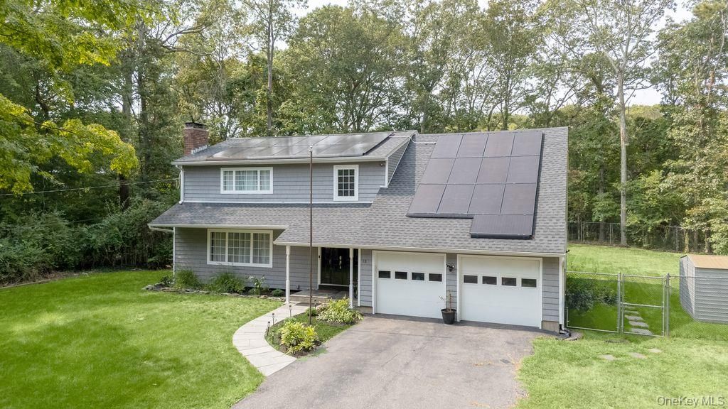 Attached, Exterior, Facade, Solar Panels, Split Level