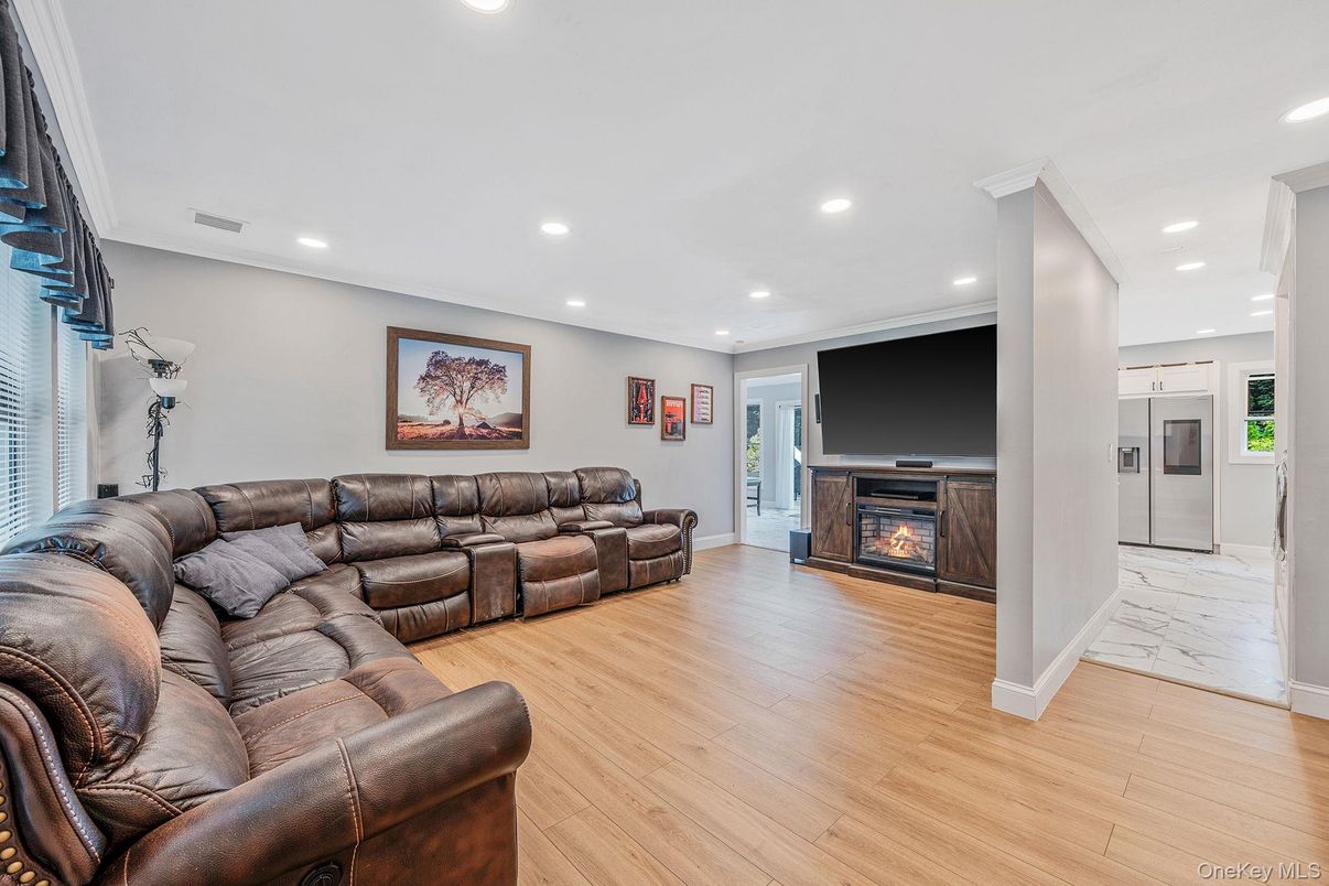 Fireplace, Interior, Living room, Recessed Lighting, Wood Texture Flooring