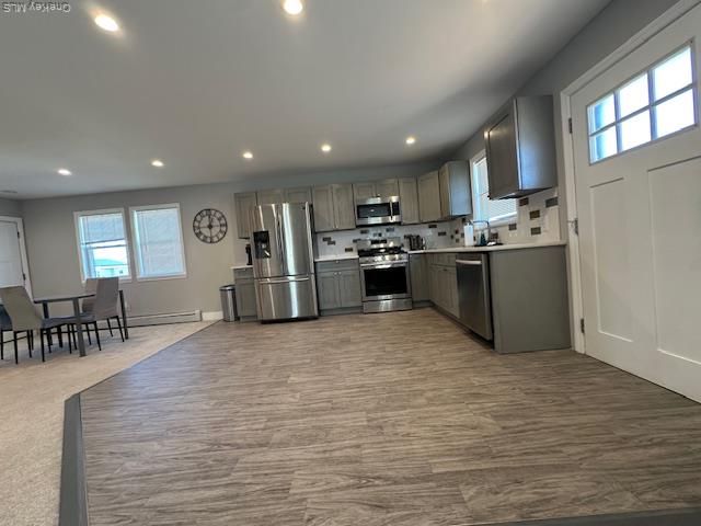Dining room, Interior, Kitchen, Recessed Lighting, Stainless Steel Appliances, Wood Texture Flooring