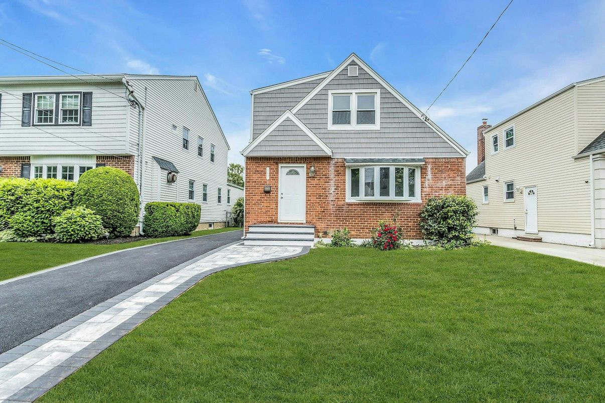 Exterior, Facade, Brick Facade, Cape Cod