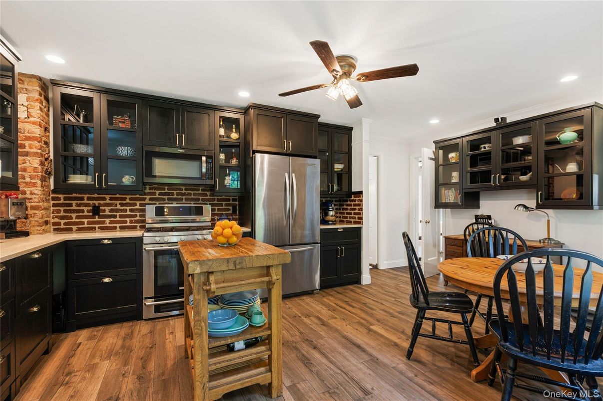 Dining room, Interior, Kitchen, Recessed Lighting, Stainless Steel Appliances, Wood Texture Flooring