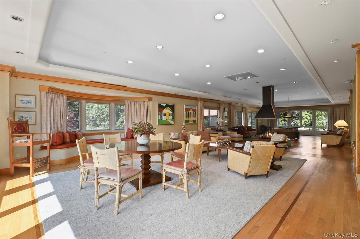 Dining room, Fireplace, Interior, Living room, Recessed Lighting, Wood Texture Flooring