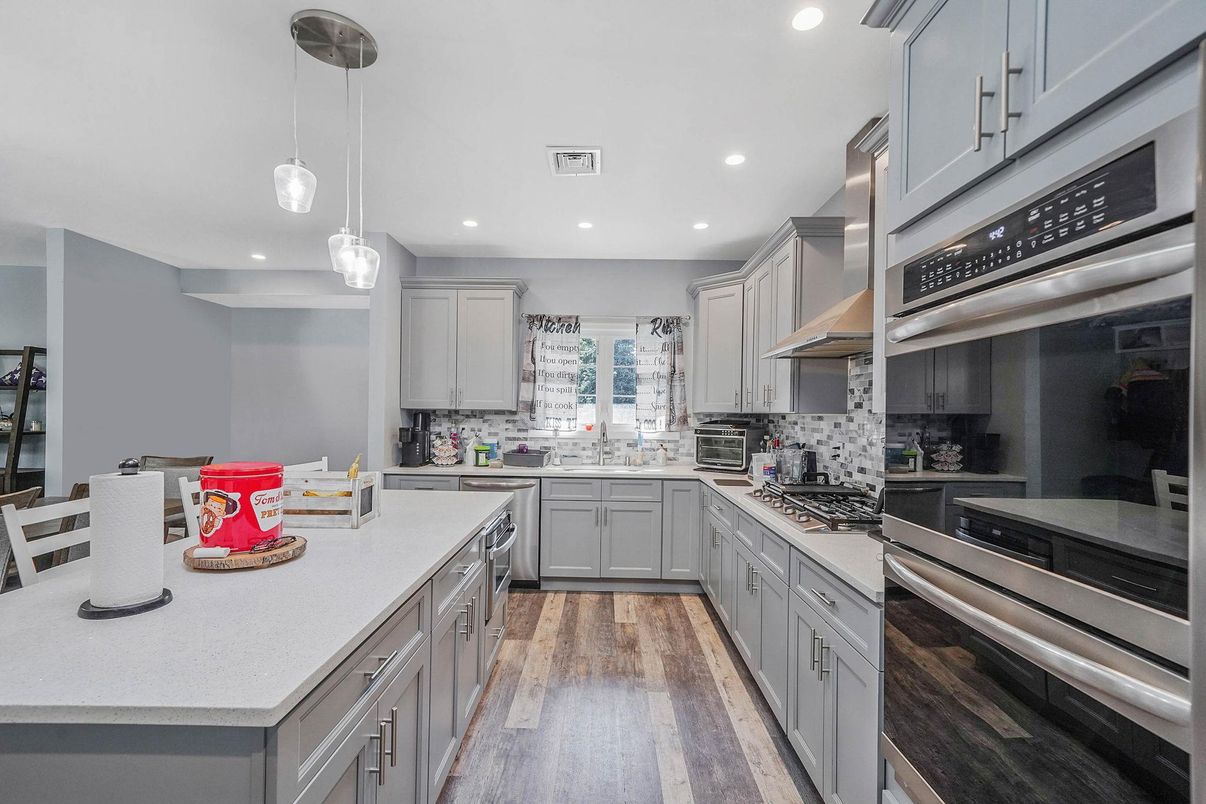 Interior, Kitchen, Pendant Lights, Recessed Lighting, Stainless Steel Appliances, Wood Texture Flooring