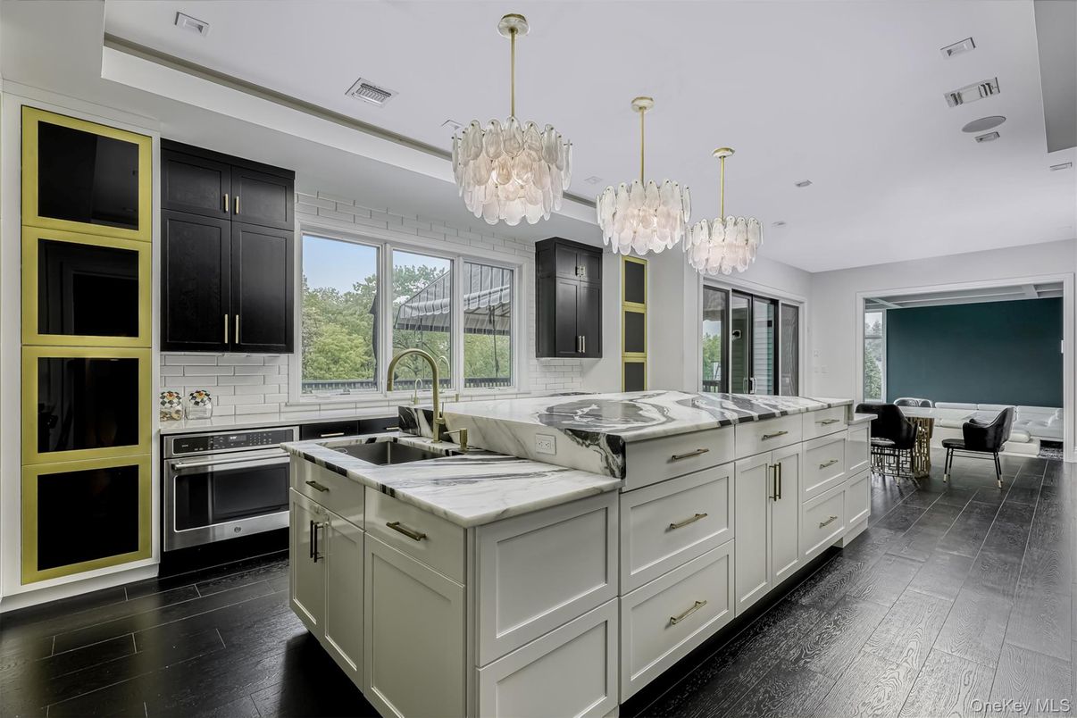 Chandelier, Dining room, Interior, Kitchen, Recessed Lighting, Stainless Steel Appliances, Wood Texture Flooring