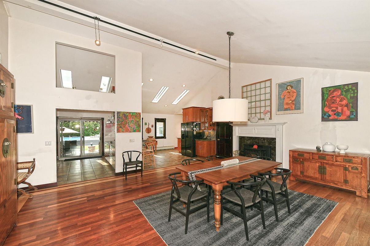Dining room, Fireplace, Interior, Pendant Lights, Recessed Lighting, Wood Texture Flooring