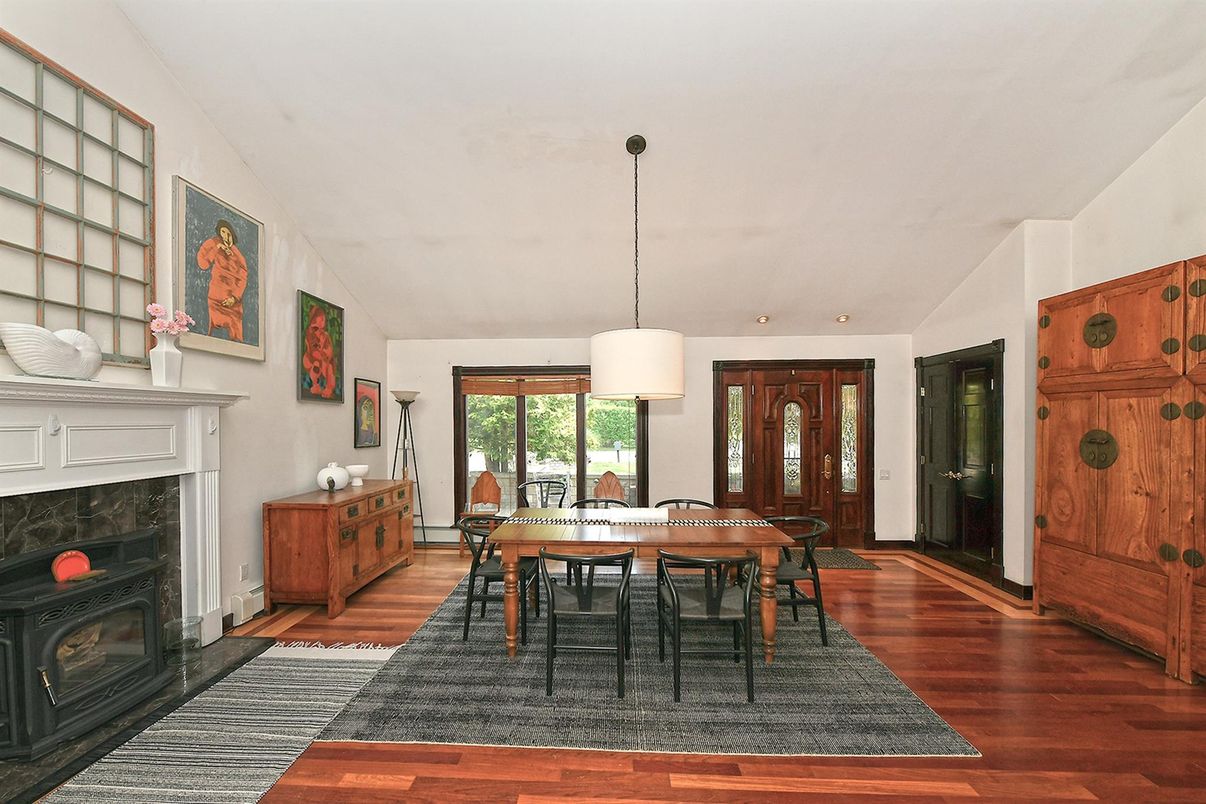 Dining room, Fireplace, Interior, Pendant Lights, Recessed Lighting, Wood Texture Flooring