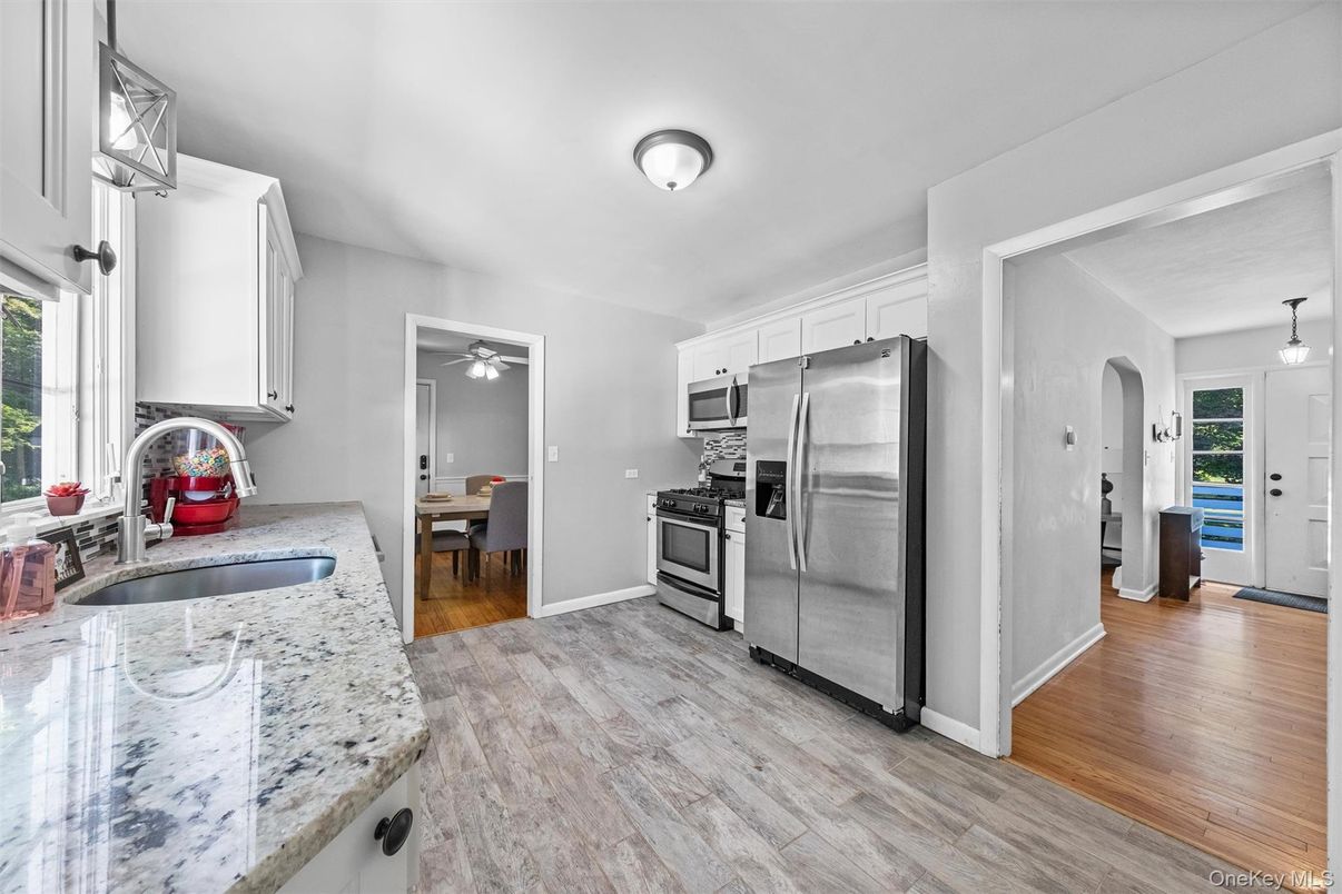 Dining room, Interior, Kitchen, Pendant Lights, Stainless Steel Appliances, Wood Texture Flooring