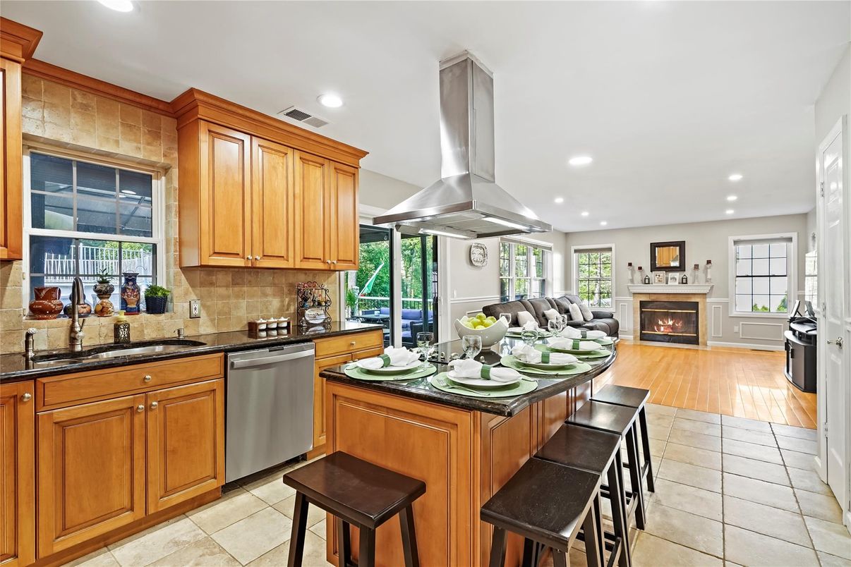 Fireplace, Interior, Kitchen, Living room, Recessed Lighting, Stainless Steel Appliances, Wood Texture Flooring