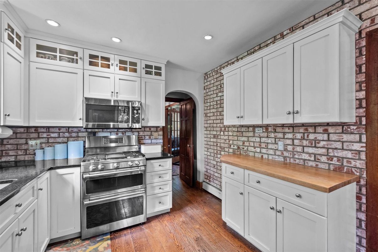 Interior, Kitchen, Recessed Lighting, Stainless Steel Appliances, Stone Walls, Wood Texture Flooring