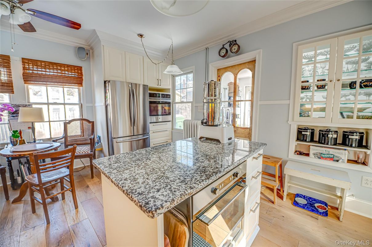 Dining room, Interior, Kitchen, Pendant Lights, Stainless Steel Appliances, Wood Texture Flooring
