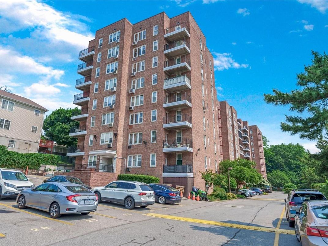 Exterior, Facade, Brick Facade, Condo Building