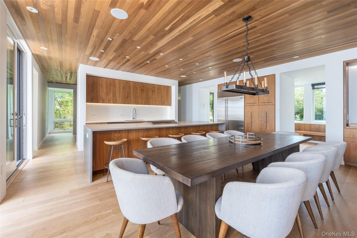 Dining room, Interior, Kitchen, Pendant Lights, Recessed Lighting, Stainless Steel Appliances, Wooden Ceilings, Wood Texture Flooring