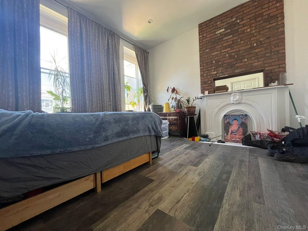 Bedroom, Fireplace, Interior, Recessed Lighting, Stone Walls, Wood Texture Flooring