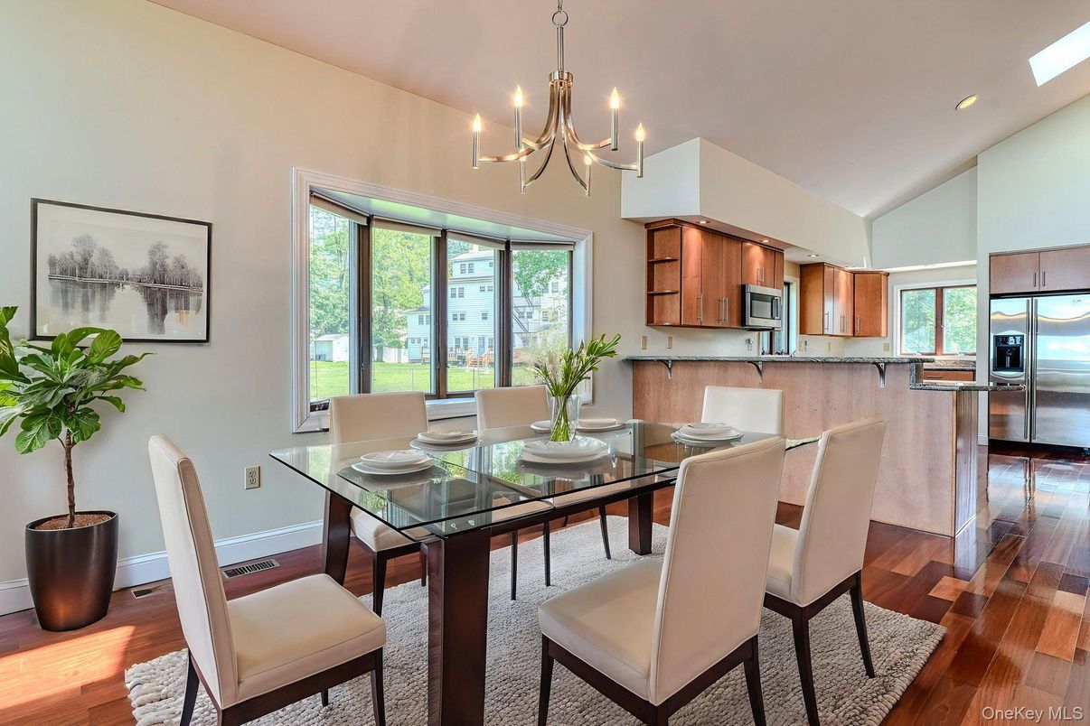Chandelier, Dining room, Interior, Kitchen, Recessed Lighting, Stainless Steel Appliances, Wood Texture Flooring
