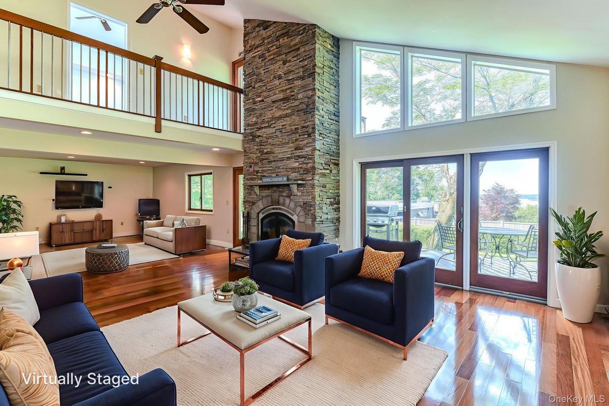 Fireplace, Interior, Living room, Recessed Lighting, Stone Walls, Wood Texture Flooring