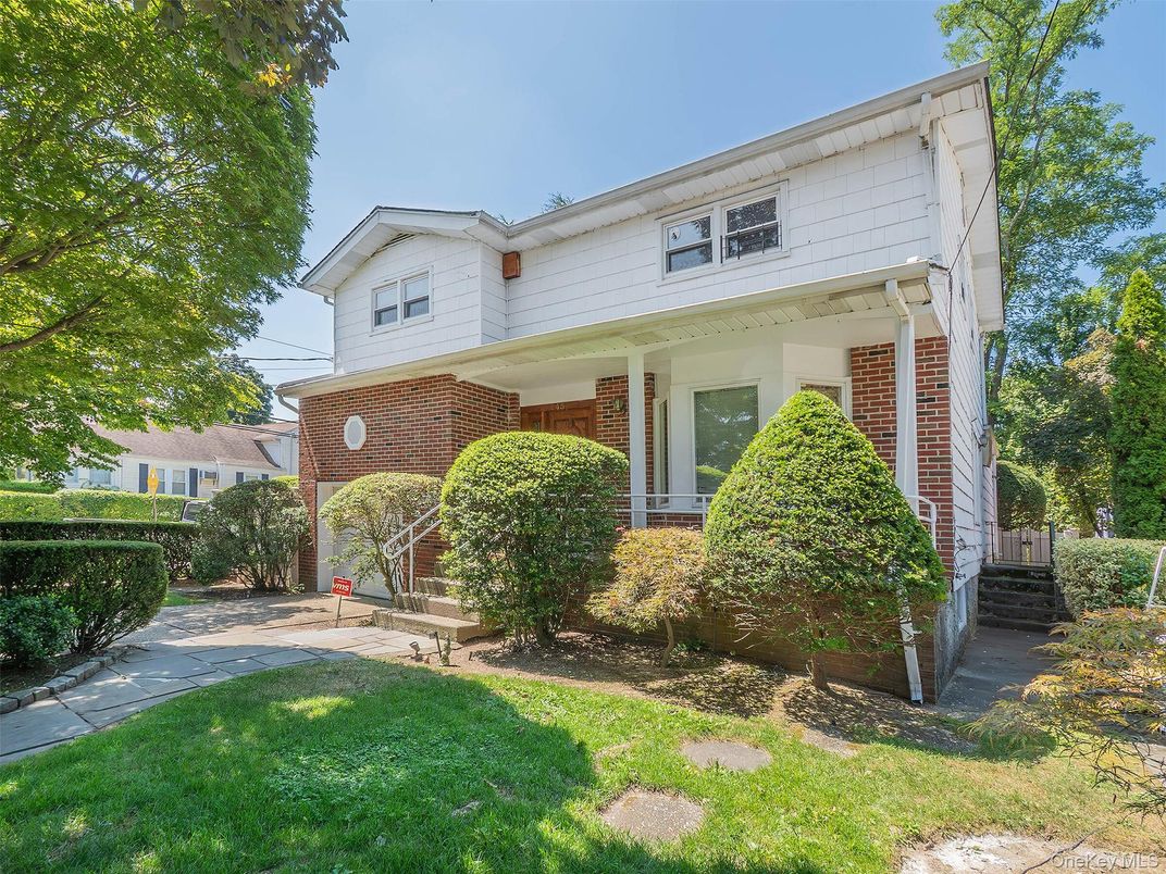 Exterior, Facade, Brick Facade, American Foursquare