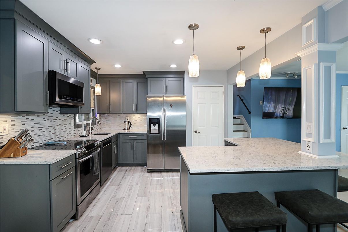 Interior, Kitchen, Pendant Lights, Recessed Lighting, Stainless Steel Appliances, Wood Texture Flooring
