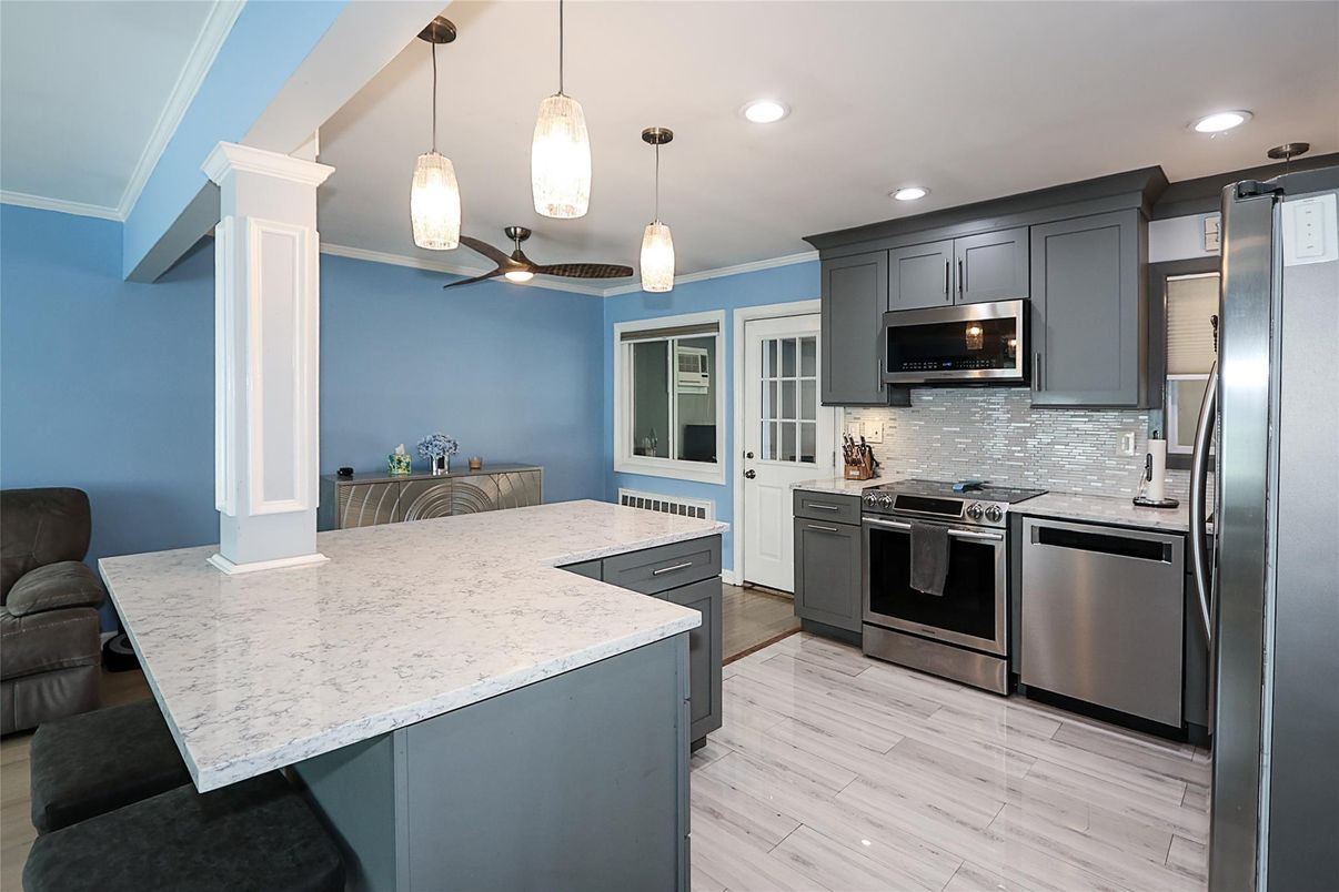 Interior, Kitchen, Pendant Lights, Recessed Lighting, Stainless Steel Appliances, Wood Texture Flooring