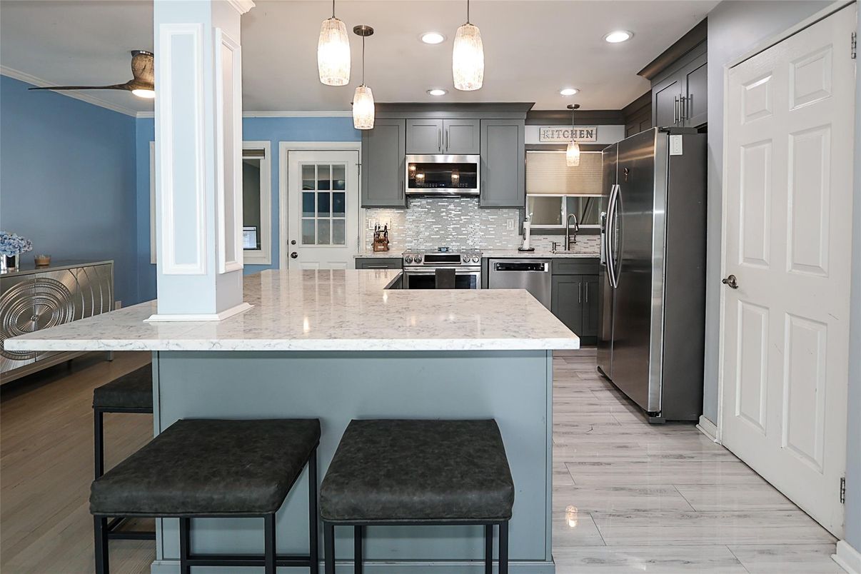 Interior, Kitchen, Pendant Lights, Recessed Lighting, Stainless Steel Appliances, Wood Texture Flooring