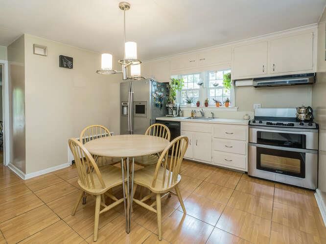 Dining room, Interior, Kitchen, Pendant Lights, Stainless Steel Appliances, Wood Texture Flooring