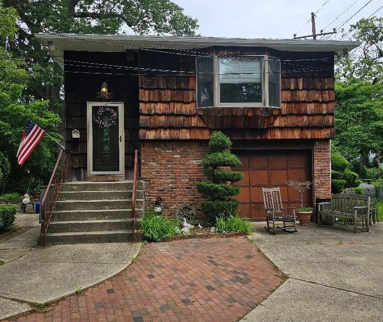 Attached, Exterior, Facade, Brick Facade, Modern