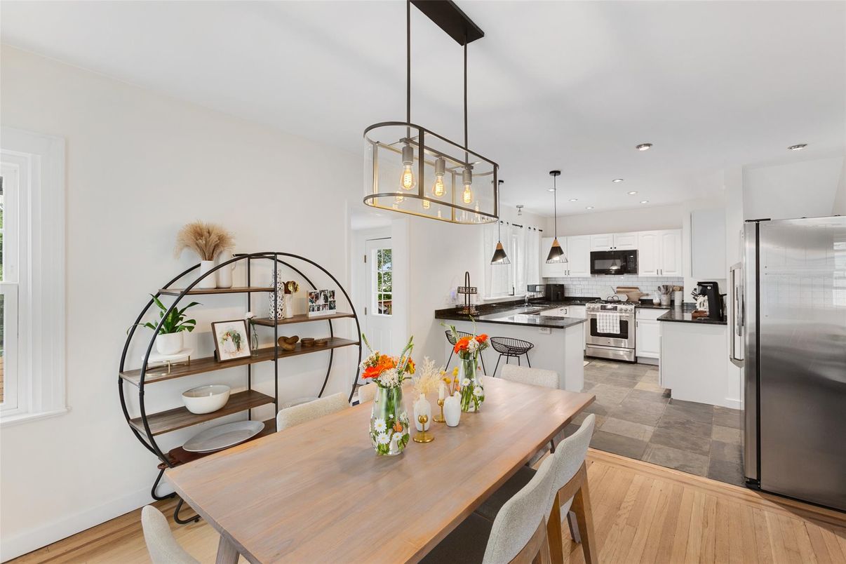 Dining room, Interior, Kitchen, Pendant Lights, Recessed Lighting, Stainless Steel Appliances, Wood Texture Flooring