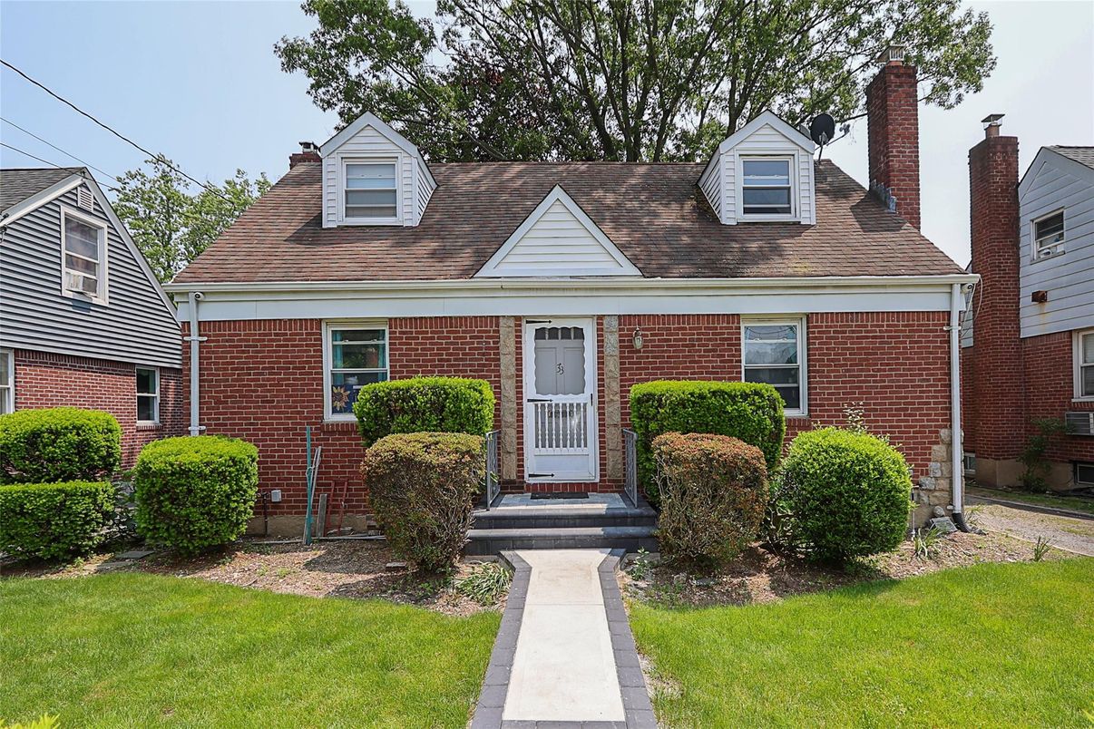 Exterior, Facade, Brick Facade, Cape Cod