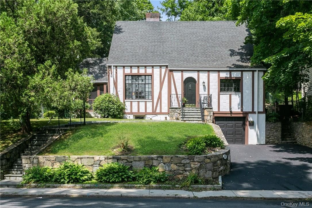 Attached, Exterior, Facade, Tudor Revival