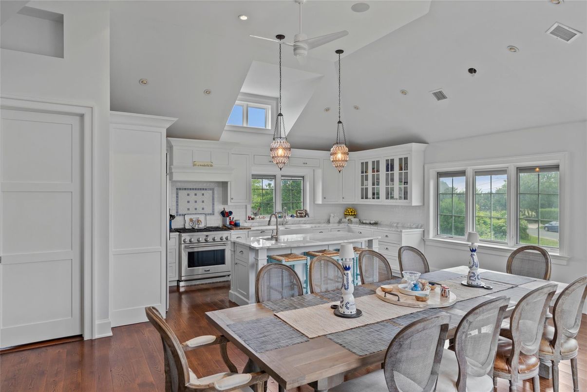 Chandelier, Dining room, Interior, Kitchen, Pendant Lights, Recessed Lighting, Stainless Steel Appliances, Wood Texture Flooring