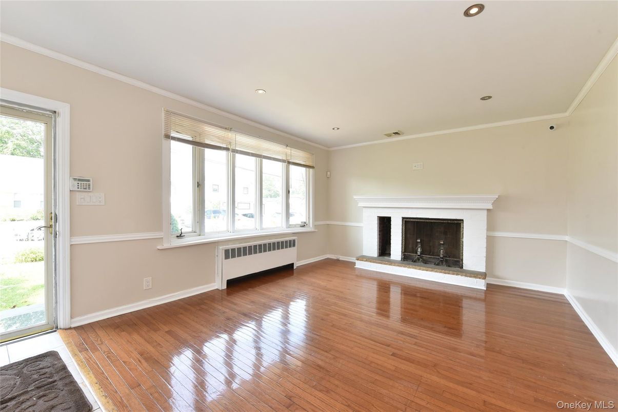 Empty room, Fireplace, Interior, Recessed Lighting, Wood Texture Flooring
