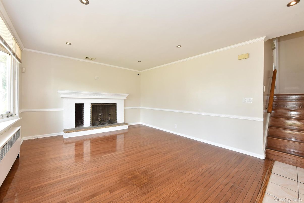 Empty room, Fireplace, Interior, Recessed Lighting, Wood Texture Flooring