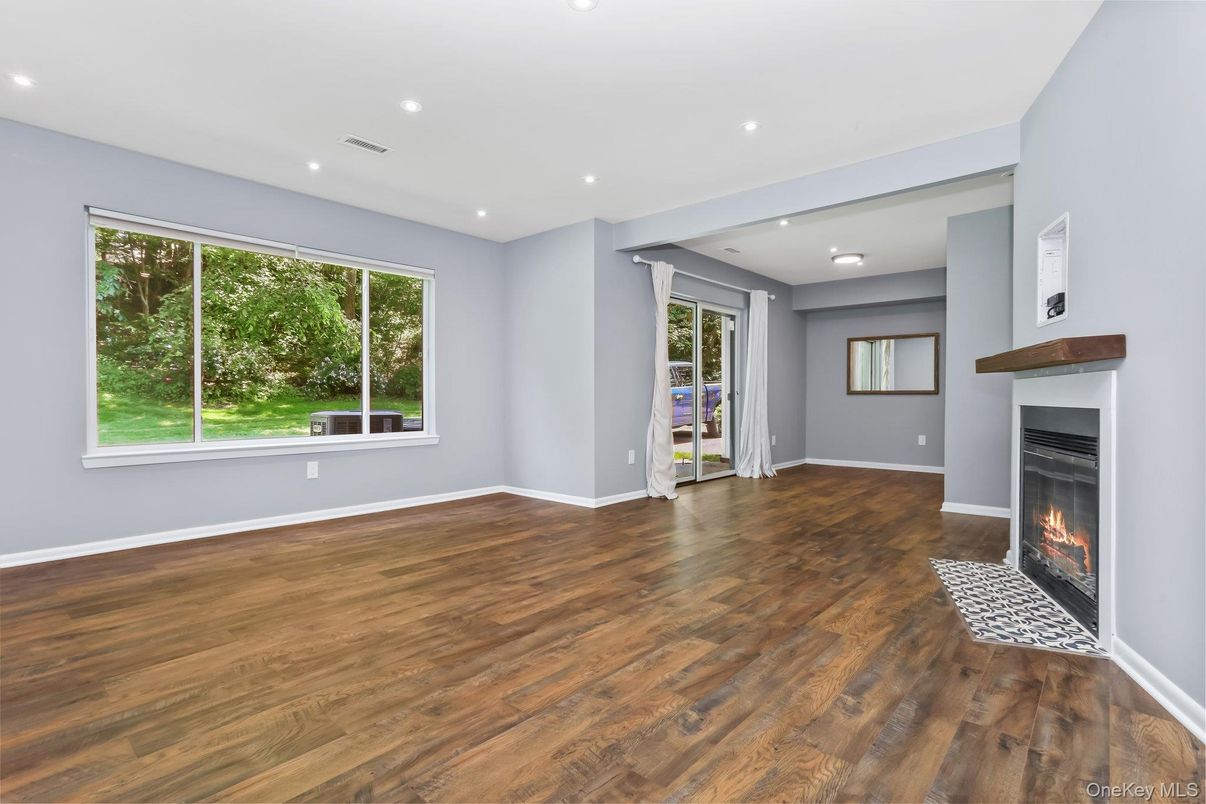Empty room, Fireplace, Interior, Recessed Lighting, Wood Texture Flooring