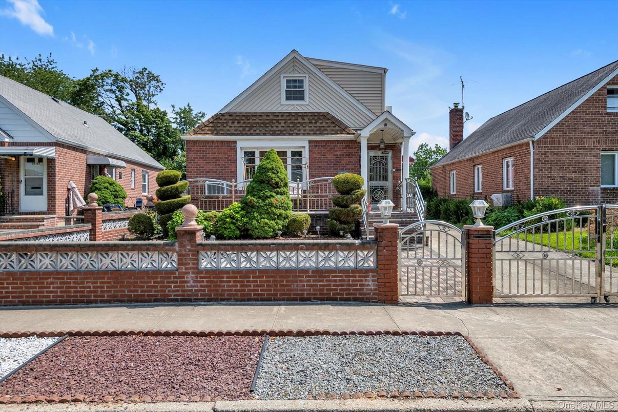 Exterior, Facade, Brick Facade, Cape Cod