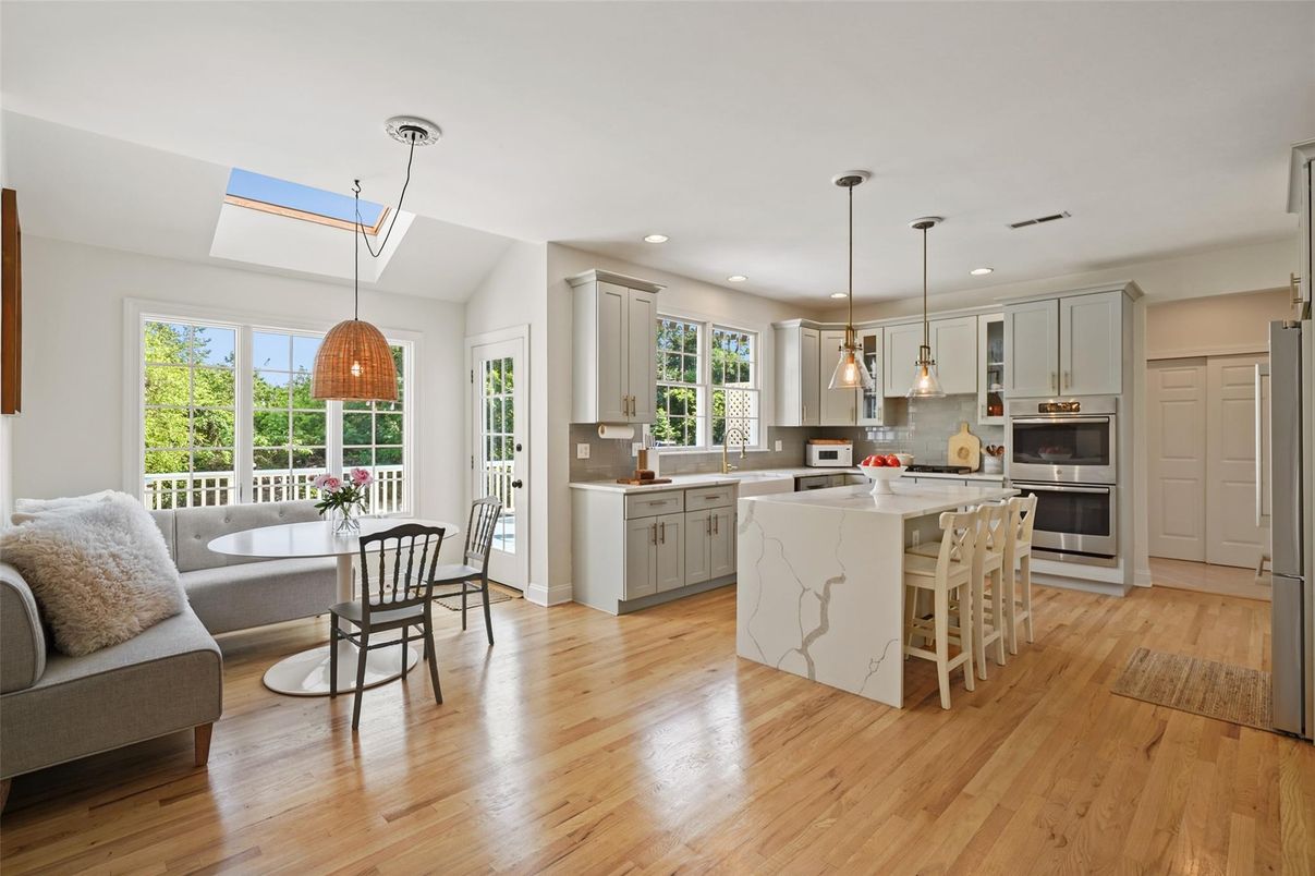 Dining room, Interior, Kitchen, Pendant Lights, Recessed Lighting, Stainless Steel Appliances, Wood Texture Flooring