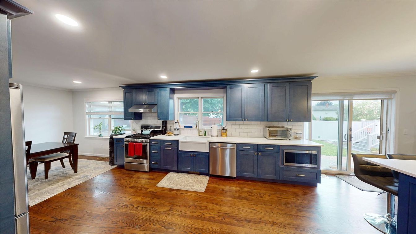 Dining room, Interior, Kitchen, Recessed Lighting, Stainless Steel Appliances, Wood Texture Flooring