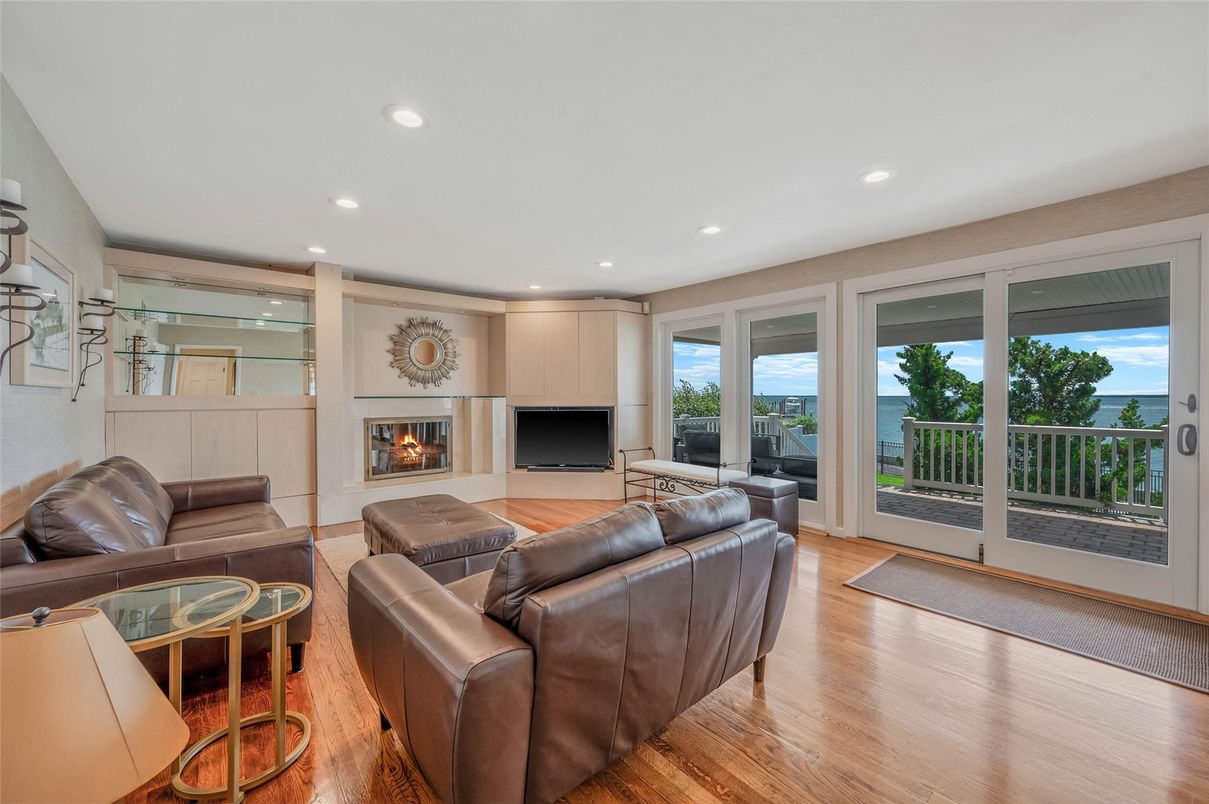 Fireplace, Interior, Living room, Recessed Lighting, Water, Wood Texture Flooring