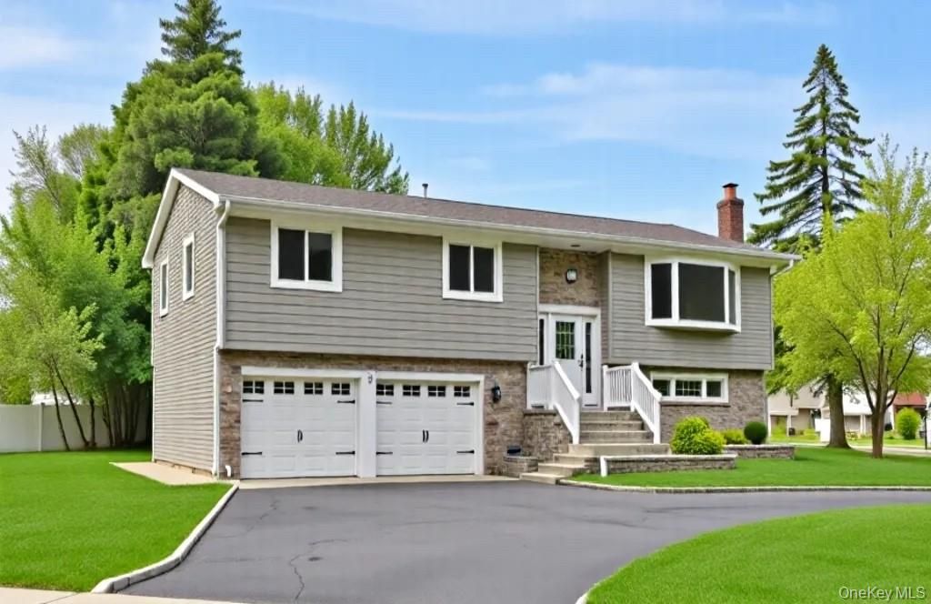 Attached, Exterior, Facade, Raised Ranch
