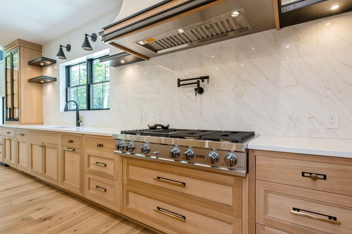 Interior, Kitchen, Marble Walls, Recessed Lighting, Stainless Steel Appliances, Wood Texture Flooring