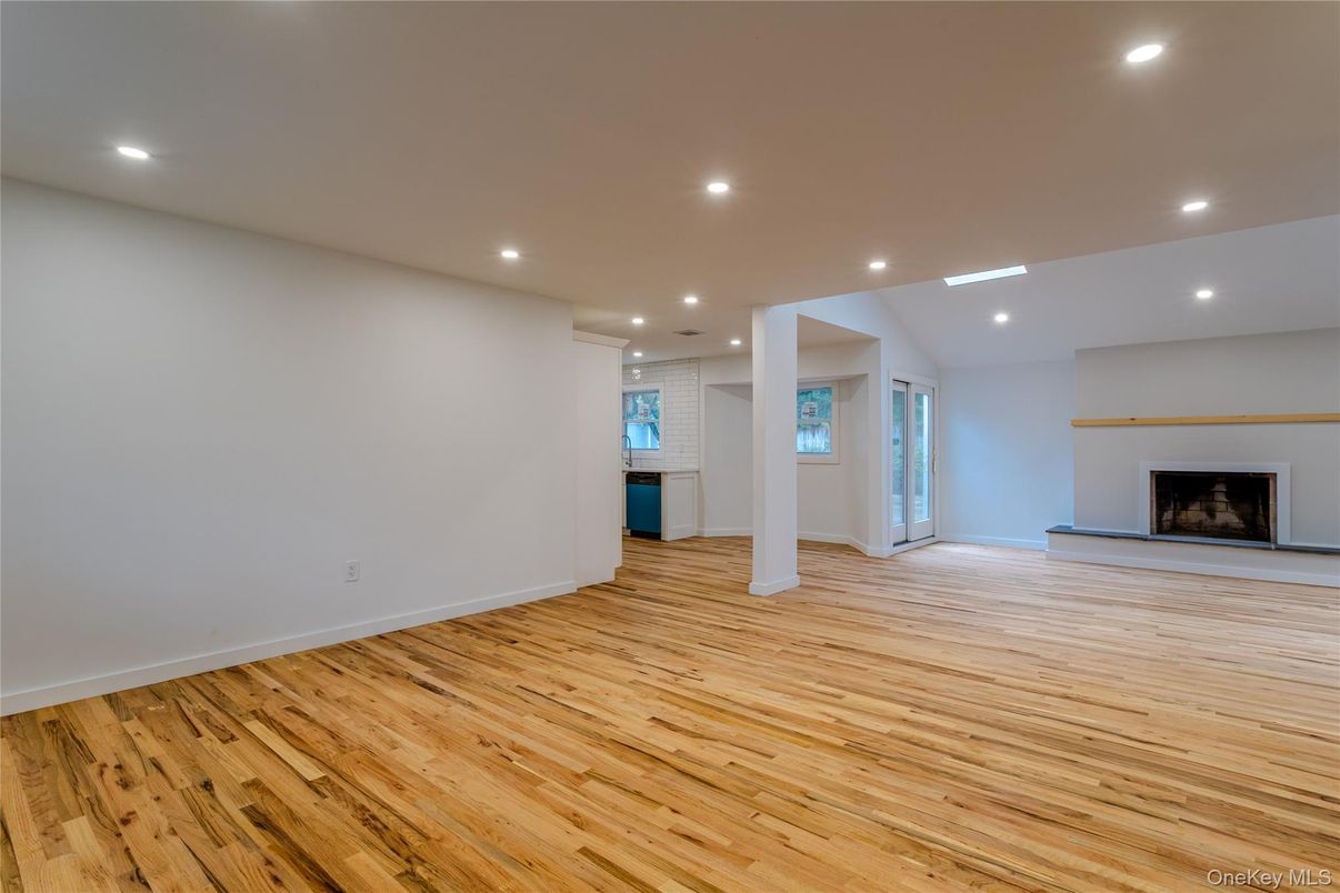 Empty room, Fireplace, Interior, Recessed Lighting, Wood Texture Flooring