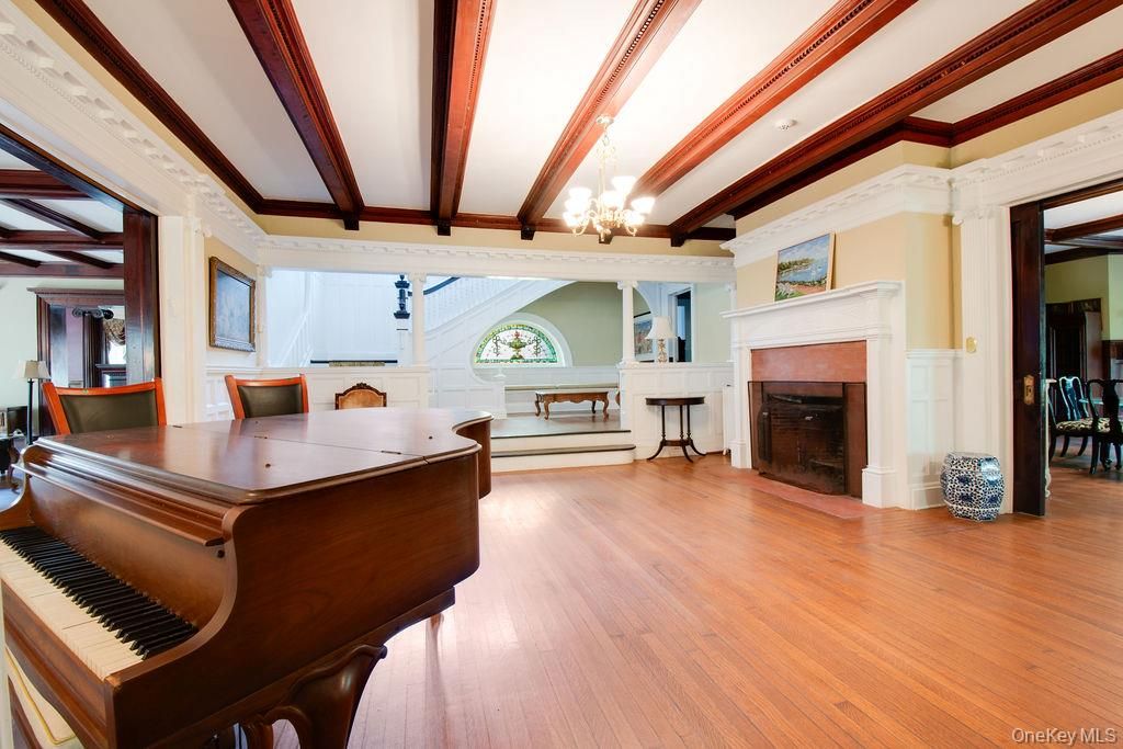 Chandelier, Fireplace, Interior, Piano, Wooden Beams, Wood Texture Flooring