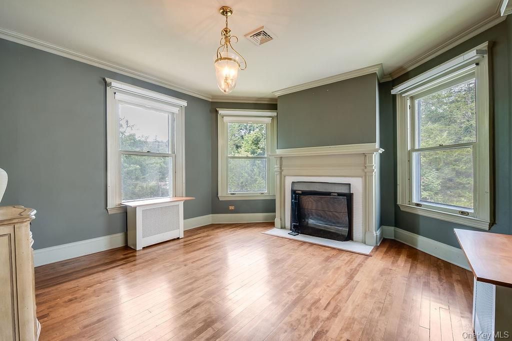 Empty room, Fireplace, Interior, Pendant Lights, Wood Texture Flooring