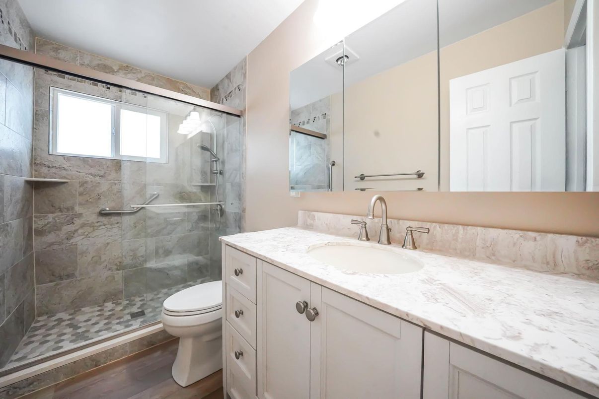 Bathroom, Glass Shower, Interior, Marble Walls, Wood Texture Flooring