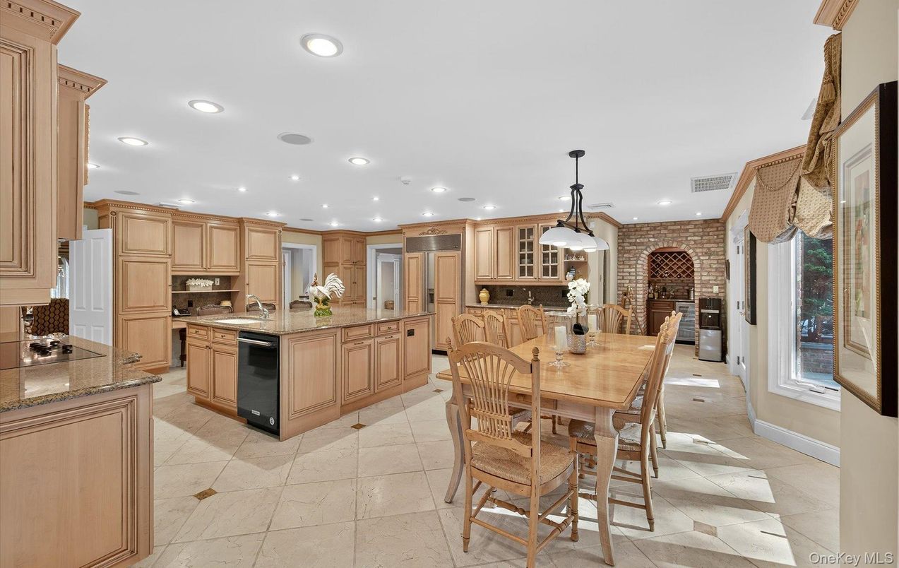 Dining room, Fireplace, Interior, Kitchen, Pendant Lights, Recessed Lighting, Stainless Steel Appliances, Stone Walls