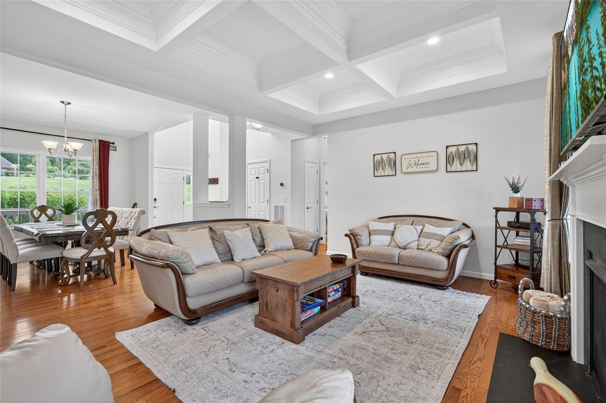 Dining room, Fireplace, Interior, Living room, Pendant Lights, Recessed Lighting, Wood Texture Flooring