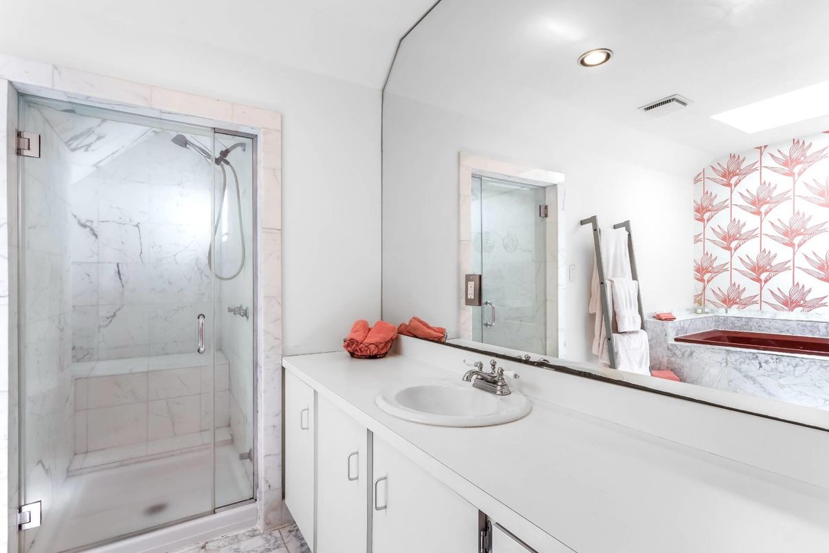 Bathroom, Dual Sink Vanities, Glass Shower, Interior, Marble, Marble Walls, Recessed Lighting