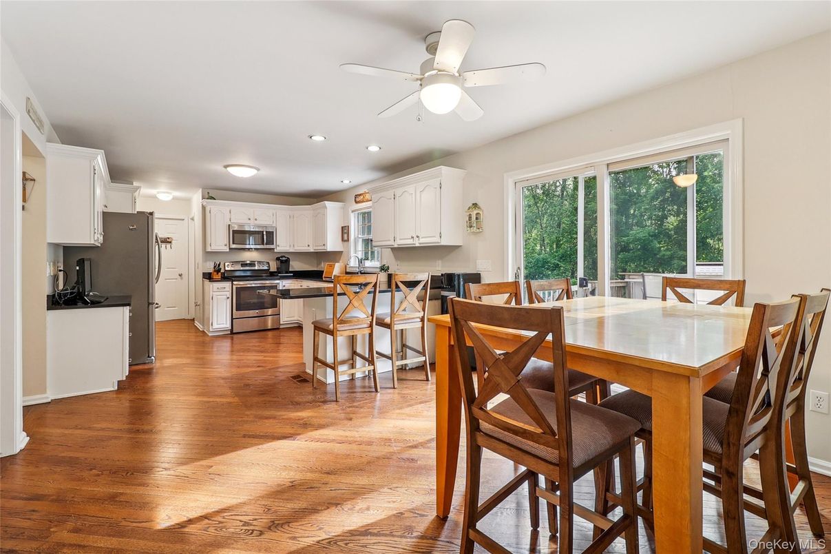Dining room, Interior, Kitchen, Recessed Lighting, Stainless Steel Appliances, Wood Texture Flooring