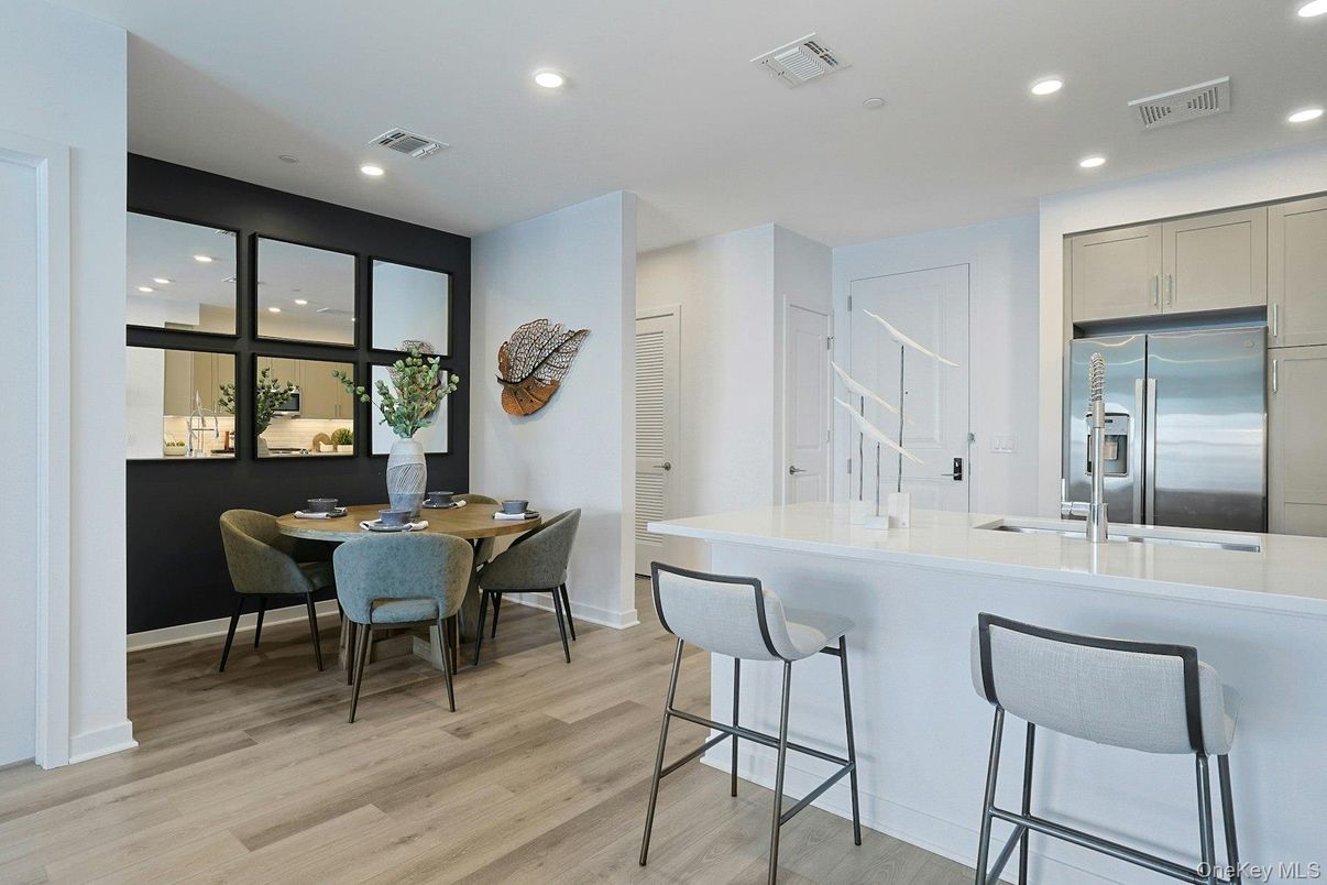 Dining room, Interior, Kitchen, Recessed Lighting, Stainless Steel Appliances, Wood Texture Flooring