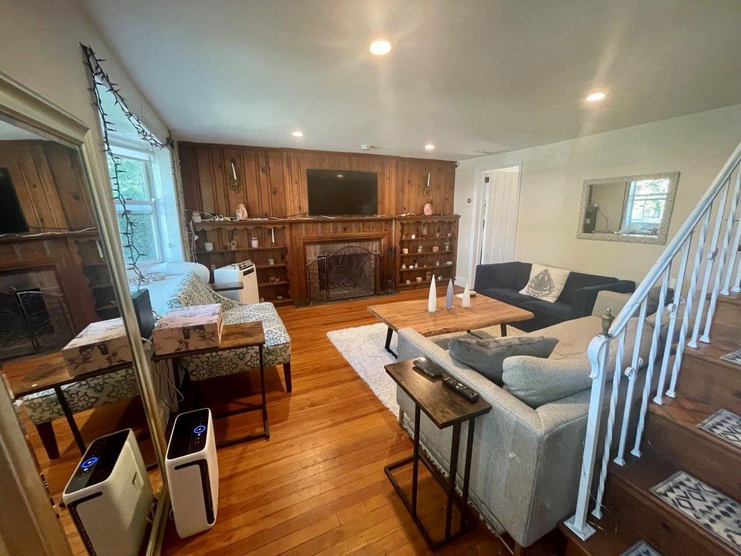 Fireplace, Interior, Living room, Recessed Lighting, Wood Texture Flooring, Wooden Walls