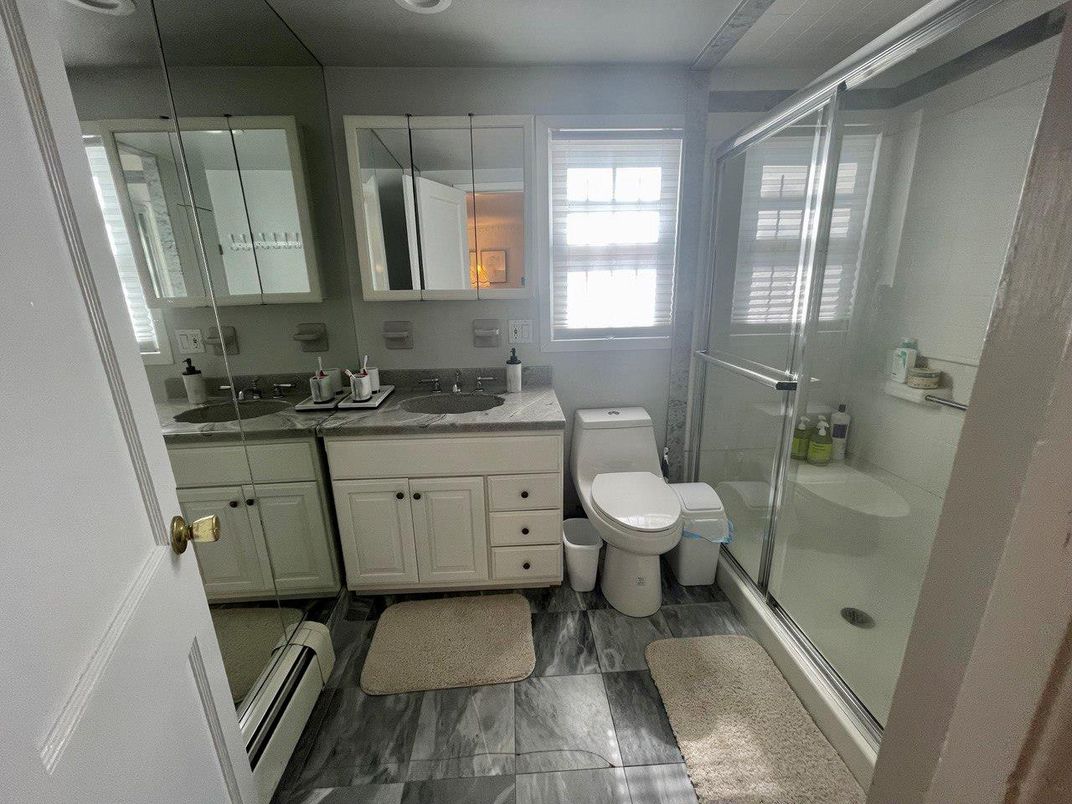 Bathroom, Dual Sink Vanities, Glass Shower, Interior, Wood Texture Flooring